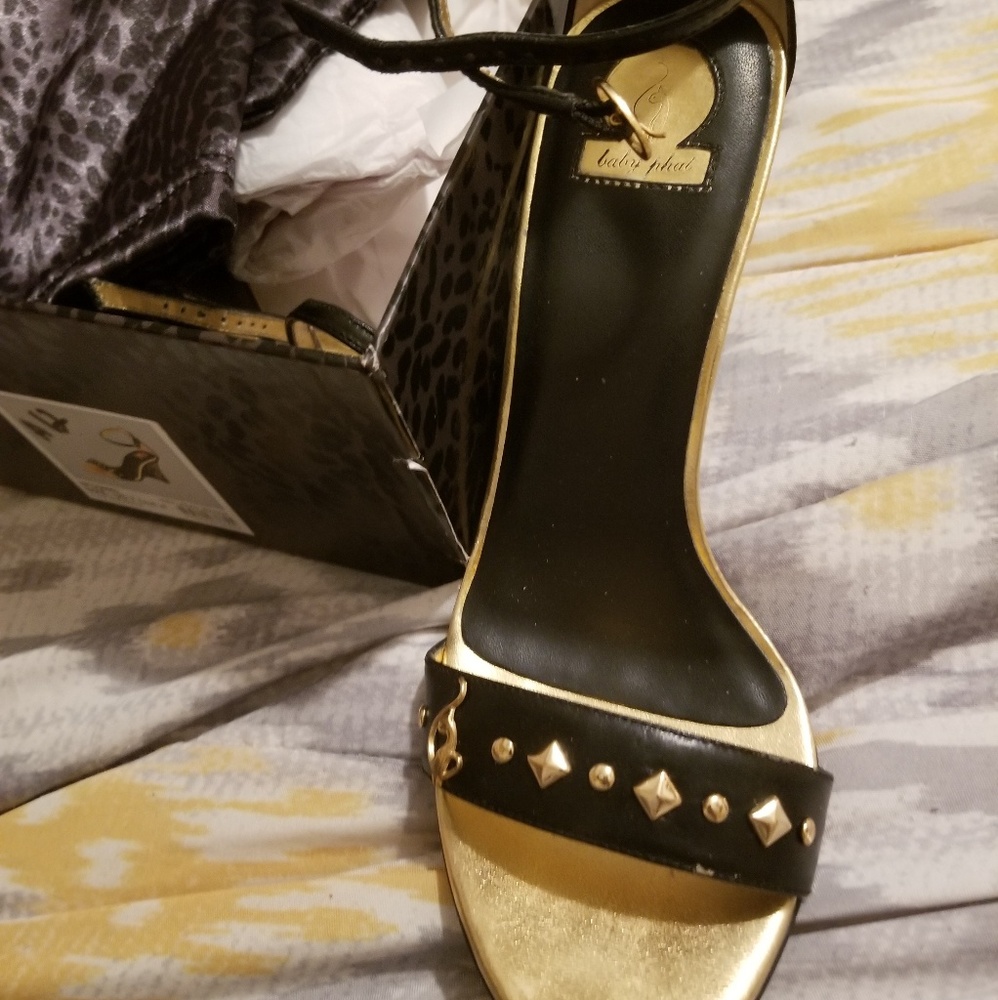Gold and black heels